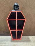 Black and red coffin