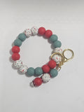 Red and green cardinal wristlet v1