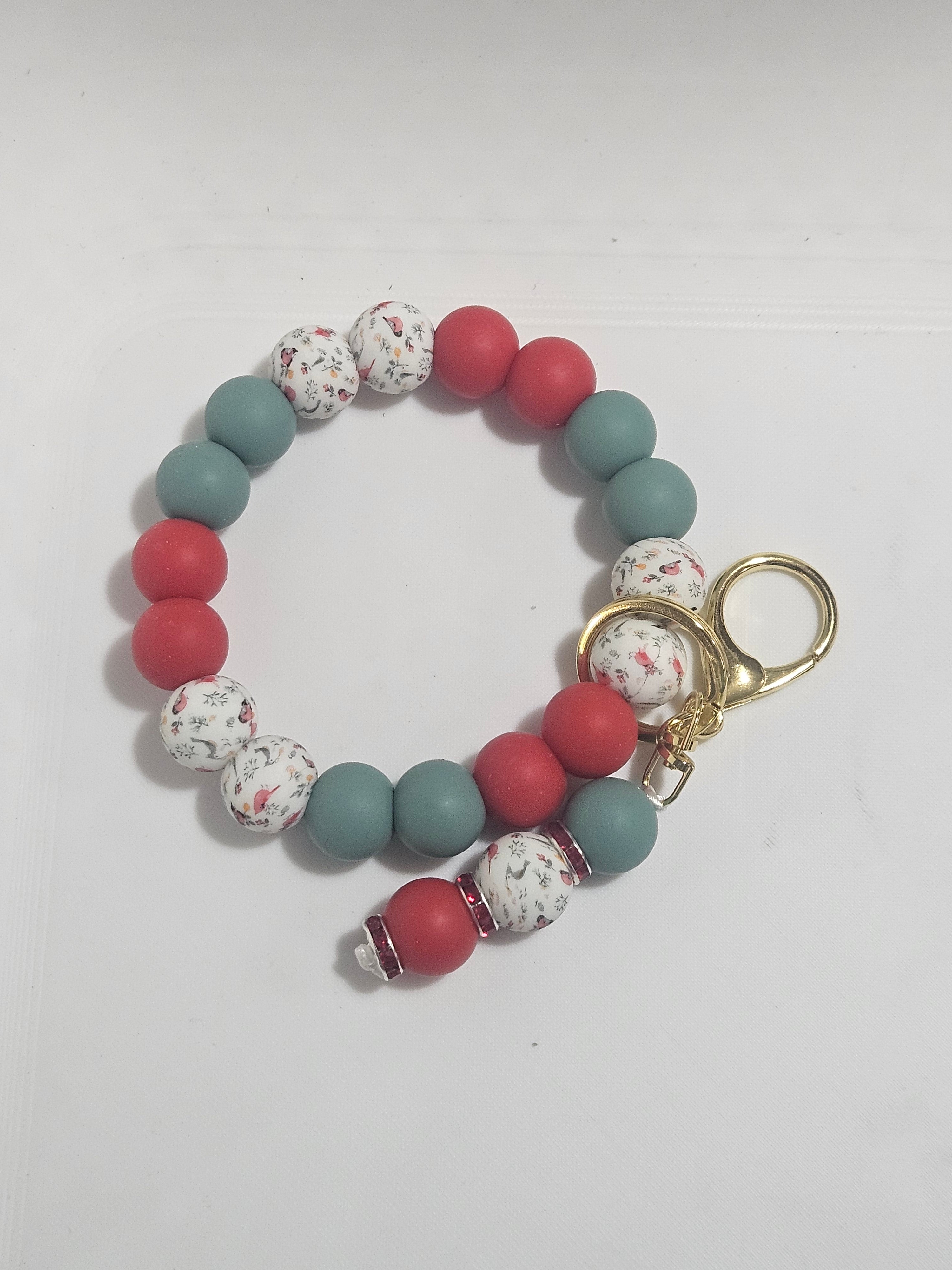 Red and green cardinal wristlet v1