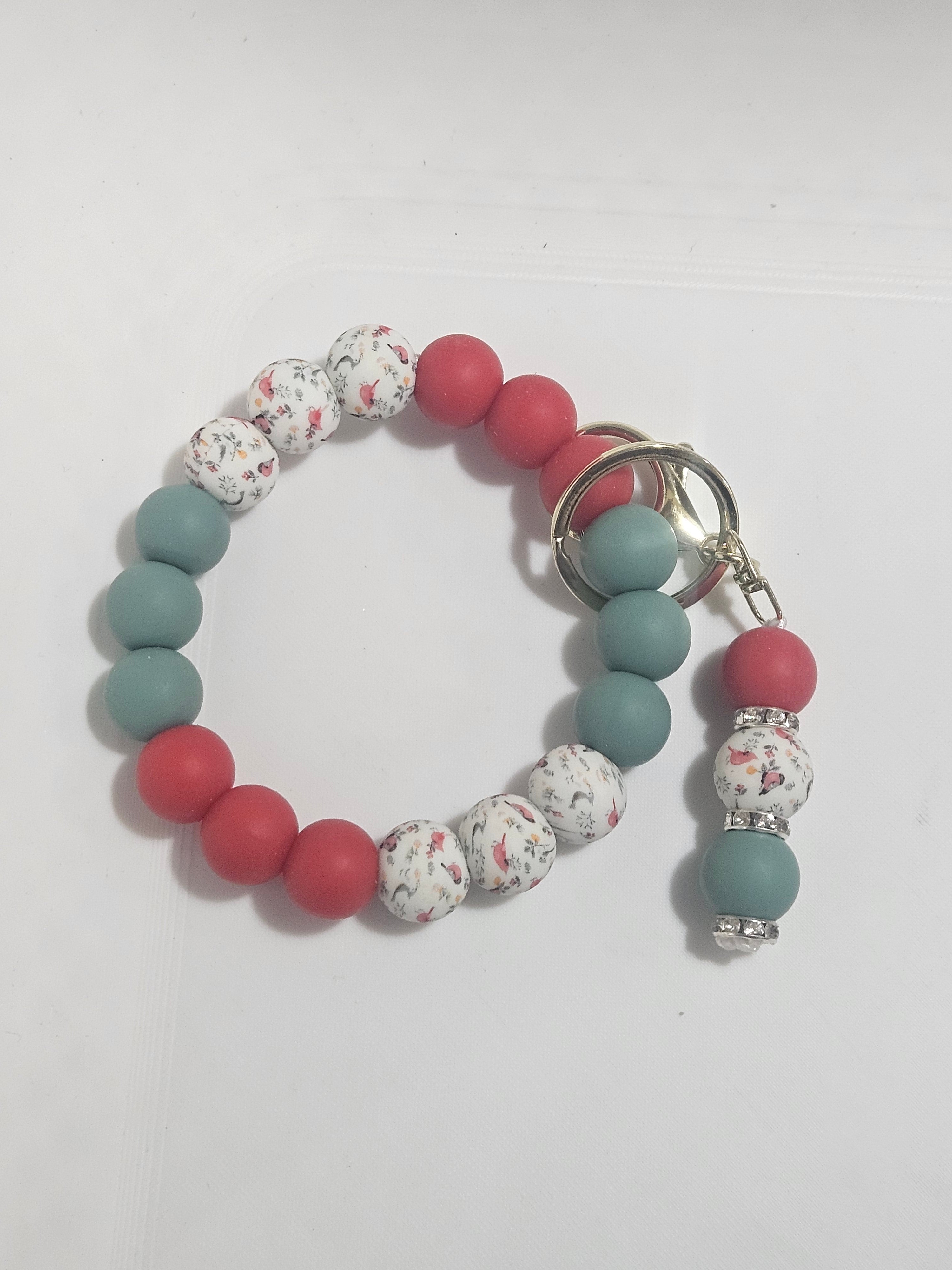 Red and green cardinal wristlet v2