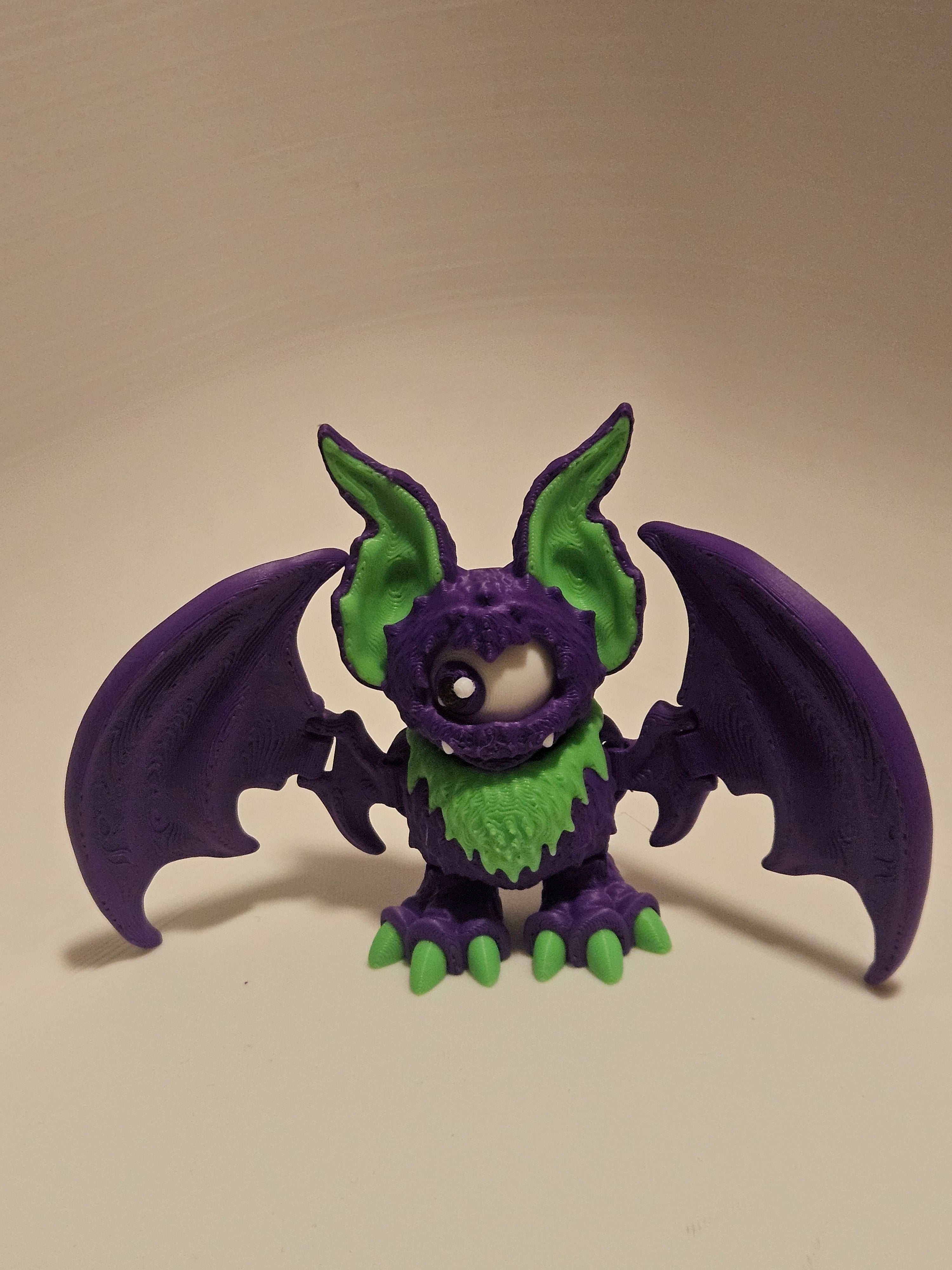 One eyed purple bat