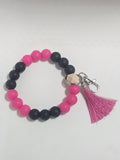 Black and pink wristlet